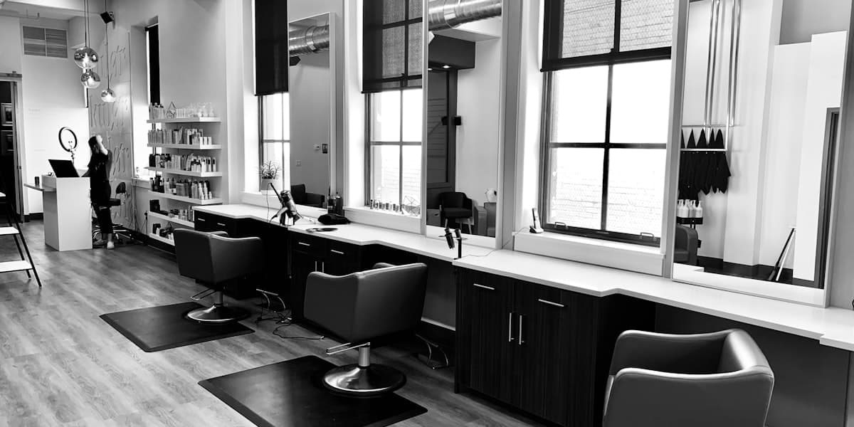 Modern salon interior with styling stations